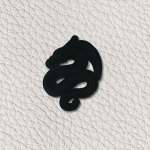 faux leather badges, PU leather badges, custom leather badges, engraved leather badges, faux leather patches, custom PU leather patches, UK made leather badges, made in the UK badges, custom leather patches UK, leather effect badges, engraved PU leather badges, sew on leather badges, heat seal leather badges, temporary adhesive backing badges, leather patches for hats, custom leather patches for clothing, leather patches for workwear, branded leather patches, black faux leather badges, saddle tan leather badges, rawhide leather badges, Harrow badge production, engraved badges made in Harrow, custom badge backing options, faux leather badge colour comparison